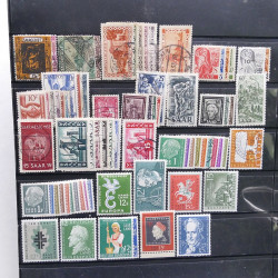 Lot massif de timbres de pays d'expression Française neufs et oblitérés en 2 albums.