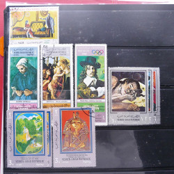 Lot massif de timbres d'Asie - Moyen Orient neufs et oblitérés en un album.