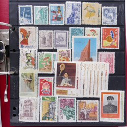 Lot massif de timbres d'Asie - Moyen Orient neufs et oblitérés en un album.