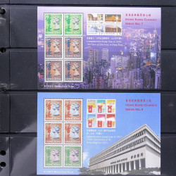 Lot massif de timbres d'Asie - Moyen Orient neufs et oblitérés en un album.