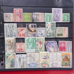 Lot massif de timbres d'Asie - Moyen Orient neufs et oblitérés en un album.