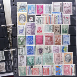 Lot massif de timbres d'Amérique du sud et centrale neufs et oblitérés en un album.