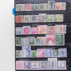Lot massif de timbres d'Amérique du sud et centrale neufs et oblitérés en un album.