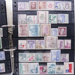 Lot massif de timbres d'Amérique du sud et centrale neufs et oblitérés en un album.