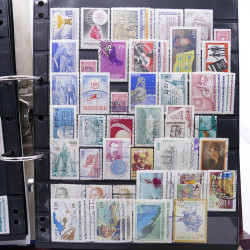 Lot massif de timbres d'Amérique du sud et centrale neufs et oblitérés en un album.