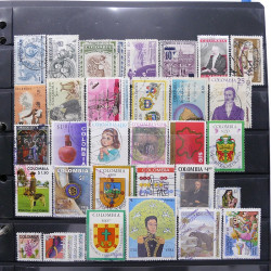 Lot massif de timbres d'Amérique du sud et centrale neufs et oblitérés en un album.