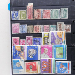 Lot massif de timbres d'Amérique du sud et centrale neufs et oblitérés en un album.
