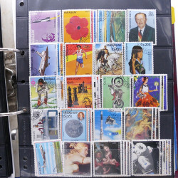 Lot massif de timbres d'Amérique du sud et centrale neufs et oblitérés en un album.
