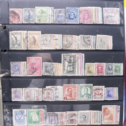 Lot massif de timbres d'Amérique du sud et centrale neufs et oblitérés en un album.