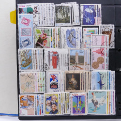 Lot massif de timbres d'Amérique du sud et centrale neufs et oblitérés en un album.