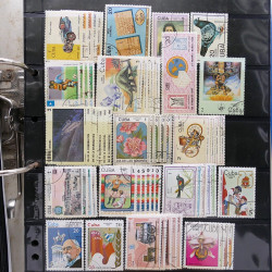 Lot massif de timbres d'Amérique du sud et centrale neufs et oblitérés en un album.