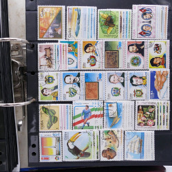 Lot massif de timbres d'Amérique du sud et centrale neufs et oblitérés en un album.
