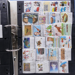 Lot massif de timbres d'Amérique du sud et centrale neufs et oblitérés en un album.