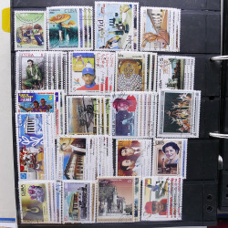 Lot massif de timbres d'Amérique du sud et centrale neufs et oblitérés en un album.