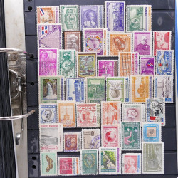 Lot massif de timbres d'Amérique du sud et centrale neufs et oblitérés en un album.