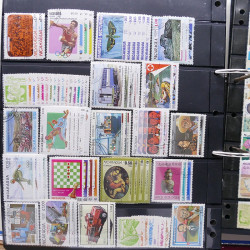 Lot massif de timbres d'Amérique du sud et centrale neufs et oblitérés en un album.