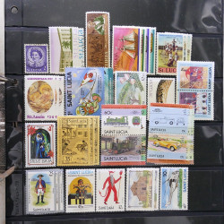 Lot massif de timbres d'Amérique du sud et centrale neufs et oblitérés en un album.