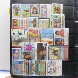 Lot massif de timbres d'Amérique du sud et centrale neufs et oblitérés en un album.