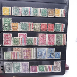 Lot massif de timbres d'Amérique et Afrique neufs et oblitérés en album.