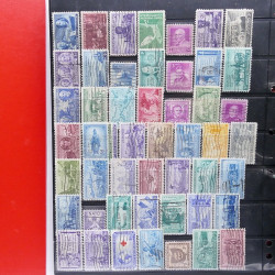 Lot massif de timbres d'Amérique et Afrique neufs et oblitérés en album.