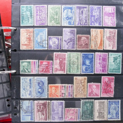 Lot massif de timbres d'Amérique et Afrique neufs et oblitérés en album.