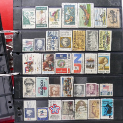 Lot massif de timbres d'Amérique et Afrique neufs et oblitérés en album.