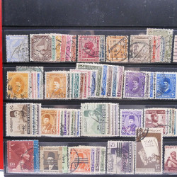 Lot massif de timbres d'Amérique et Afrique neufs et oblitérés en album.