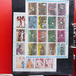 Lot massif de timbres d'Amérique et Afrique neufs et oblitérés en album.