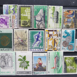 Lot massif de timbres d'Amérique et Afrique neufs et oblitérés en album.