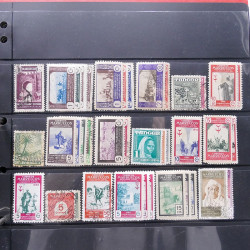 Lot massif de timbres d'Amérique et Afrique neufs et oblitérés en album.