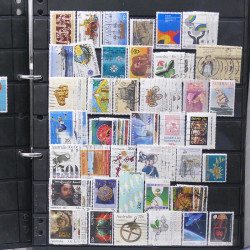 Lot de timbres des pays d'Océanie neufs et oblitérés en album.