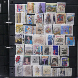Lot de timbres des pays d'Océanie neufs et oblitérés en album.