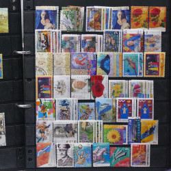 Lot de timbres des pays d'Océanie neufs et oblitérés en album.