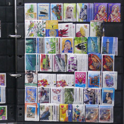 Lot de timbres des pays d'Océanie neufs et oblitérés en album.