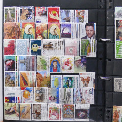 Lot de timbres des pays d'Océanie neufs et oblitérés en album.