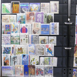 Lot de timbres des pays d'Océanie neufs et oblitérés en album.