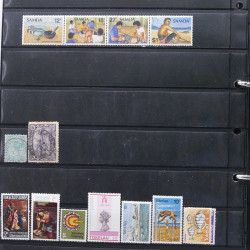 Lot de timbres des pays d'Océanie neufs et oblitérés en album.
