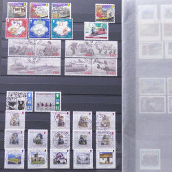 Lot de timbres d'Île de Man oblitérés en un album.