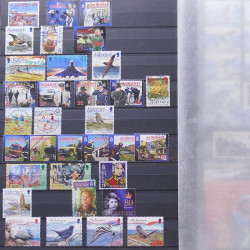 Lot de timbres d'Alderney et Guernesey oblitérés en un album.