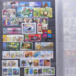 Lot de timbres d'Alderney et Guernesey oblitérés en un album.