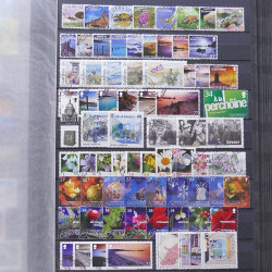 Lot de timbres d'Alderney et Guernesey oblitérés en un album.