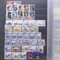 Lot de timbres d'Alderney et Guernesey oblitérés en un album.