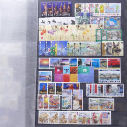 Lot de timbres d'Alderney et Guernesey oblitérés en un album.