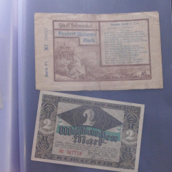 Lot de 100 billets de banque anciens d'Allemagne en un album.