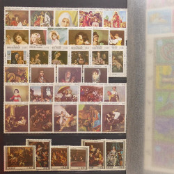 Lot de timbres d'Amérique neufs et oblitérés en un album.