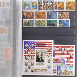 Lot de timbres d'Amérique neufs et oblitérés en un album.