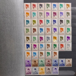 Lot de timbres d'Asie neufs et oblitérés en un album.