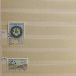 Lot de timbres Russie - Roumanie neufs et oblitérés en un album.