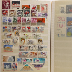 Lot de timbres Russie - Roumanie neufs et oblitérés en un album.