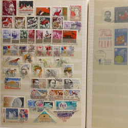 Lot de timbres Russie - Roumanie neufs et oblitérés en un album.